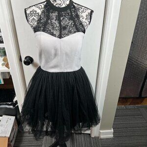 A. Drea black and white tulle lace party cocktail mini dress.  Size M